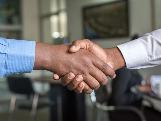 Graduate School of Business A handshake