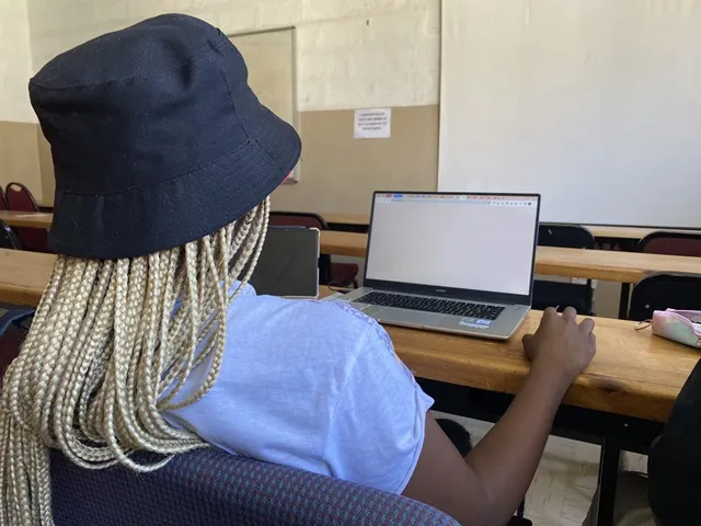 A student using a macbook