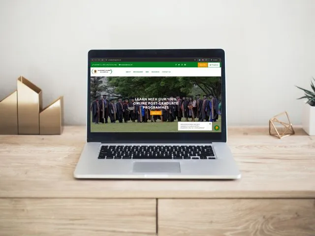 A macbook with the e-learning website viewed